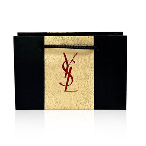 كيس هدايا أسود وذهبي يحمل الشعار لأحمر الشفاه بشعار YSL