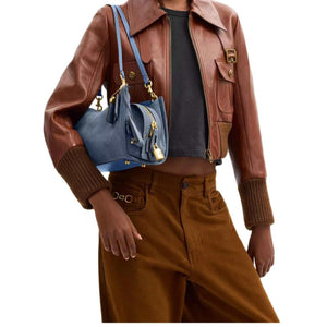 COACH Rogue 34 denim.