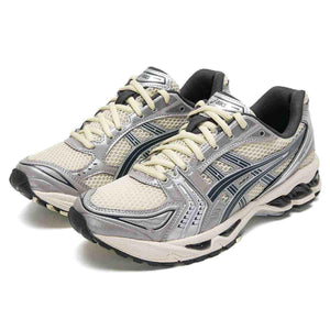 حذاء Asics Gel-Kayano 14 رياضي مريح بلون فضي وبيج.