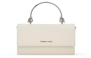 حقيبة Charles & Keith بمقبض علوي معدني وتصميم Crossbody.