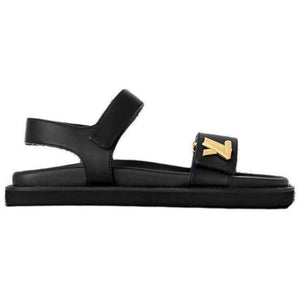 Louis Vuitton صندل Flat نسائي جلد أسود مريح بشعار ذهبي.