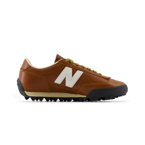 Medial side profile view of Donald Glover x New Balance RC30 cognac brown shoes with white N logo.