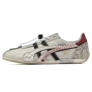 حذاء رياضي Onitsuka Tiger PandaPrank بتصميم عصري أبيض وأسود.