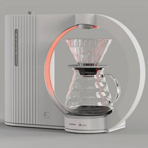 ماكينة Drip Coffee لتحضير القهوة المقطرة بتصميم عصري أبيض.