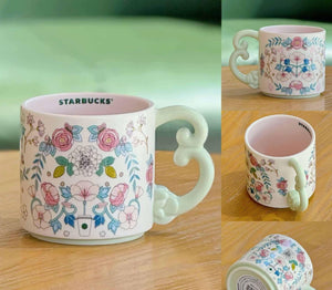 كوب Starbucks بنقشة Floral ولون أخضر ربيعي.