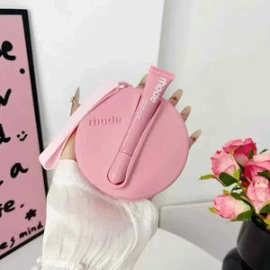 Rhode Beauty Peptide Lip Tint مع حقيبة سيليكون مطابقة اللون رود.