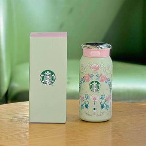 Tumbler Starbucks بنقشة زهور الربيع ولون أخضر نعناعي.