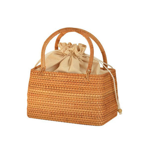 حقيبة يد Handbag من الخوص الطبيعي بتصميم فني يدوي مميز.