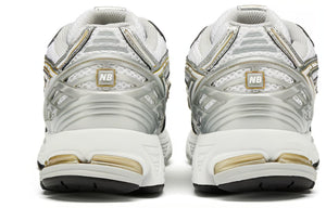 أصلي 100% حذاء New Balance 1906R باللون الأبيض والذهبي - رفعة