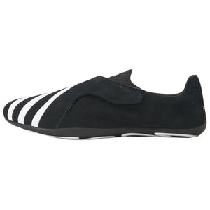 حذاء اديداس فاريل ويليامز للجنسين باللون الأسود والأبيض