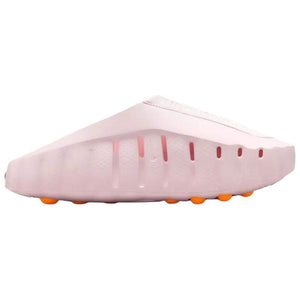 Studio profile shot of the Nike Mind 001 baby pink slide, highlighting its sleek architectural silhouette and lower ventilation slits.