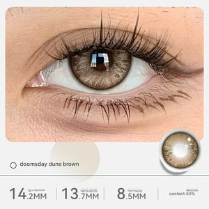 Doomsday Dune Brown variant of Tinacon Korean contact lenses showcasing a soft brown hue and a 14.2mm diameter.