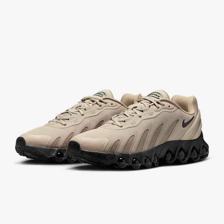 Nike AIR MAX DN8 Low-Top Shock-Absorbing Men's Sneakers in beige with black soles.
