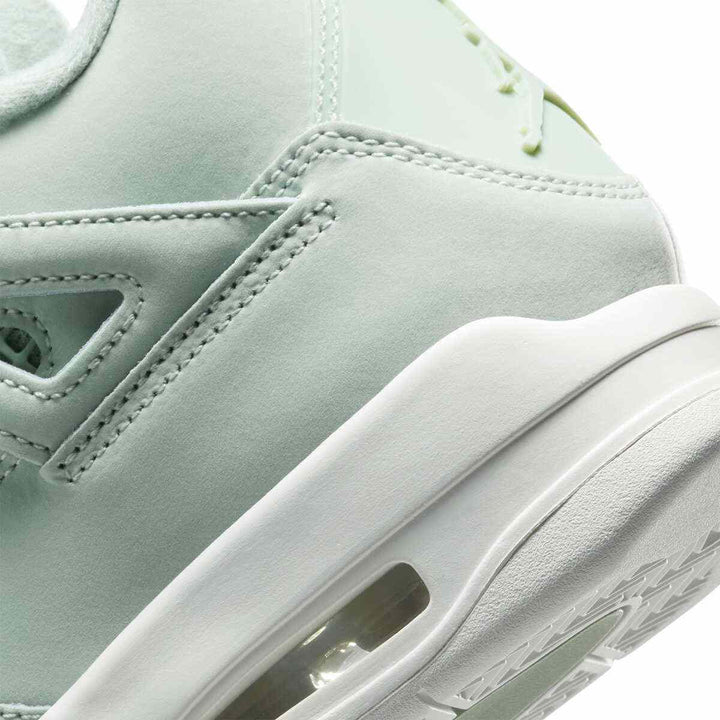 Air Jordan 4 Retro sneaker in light green Seafoam color with visible Air-Sole unit.