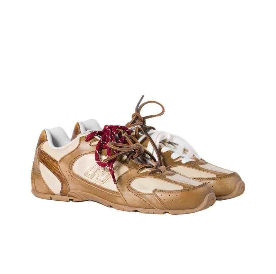 سنيكيرز New Balance X Miu Miu 530 SL deco من جلد العجل.