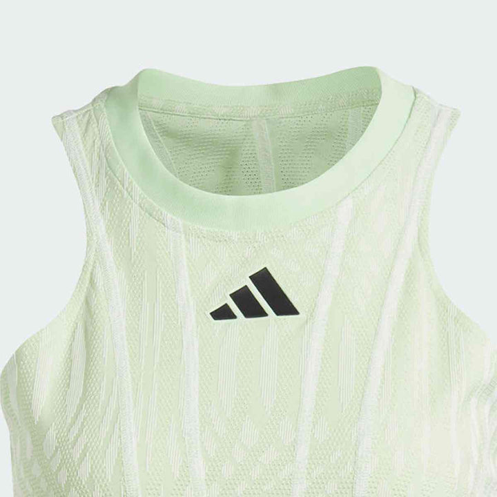 Sleeveless light green Adidas women's sport dress with logo.