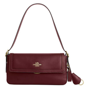 COACH Etta 25  حقيبة مارون متوسطة تجمع بين الفخامة والعملية.