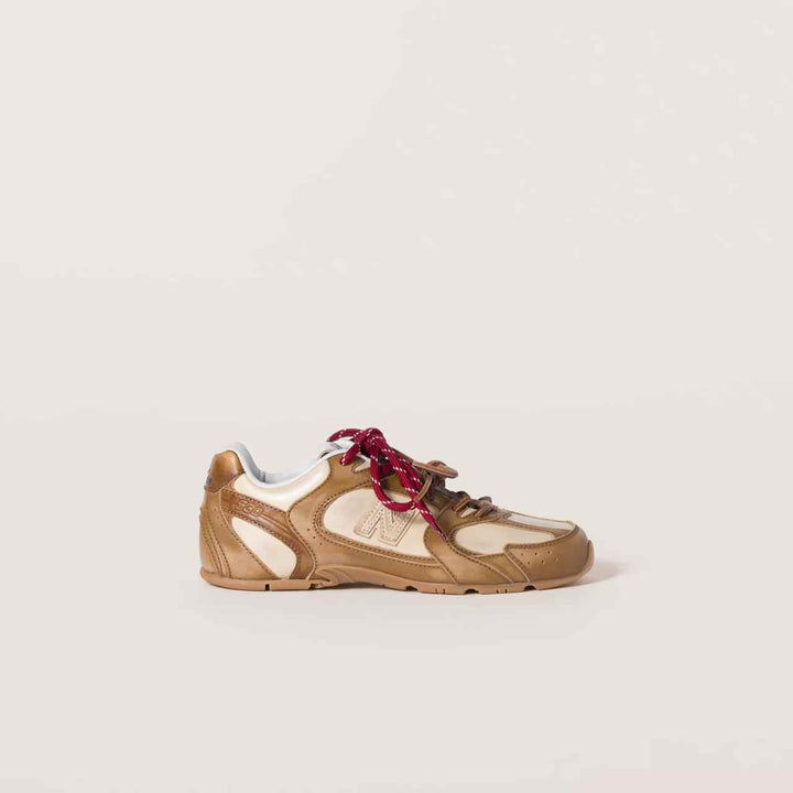 New Balance X Miu Miu 530 SL calf leather sneakers with cotton and leather laces.