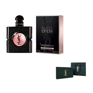 عطر بلاك اوبيوم مع علبتين خضراوين من زاوية أخرى