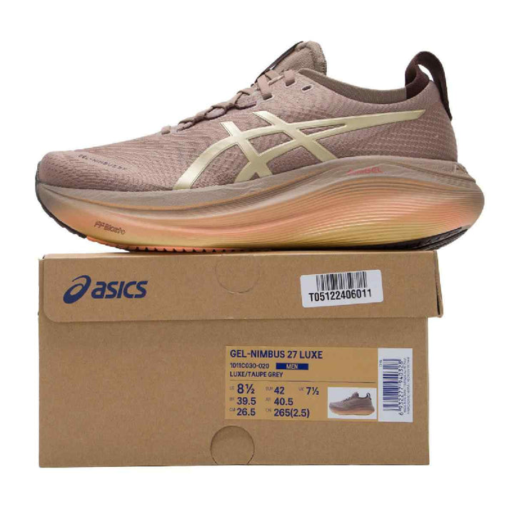 ASICS GEL-NIMBUS 27 LUXE running shoe on a box, featuring brown jacquard mesh upper with gold accents.