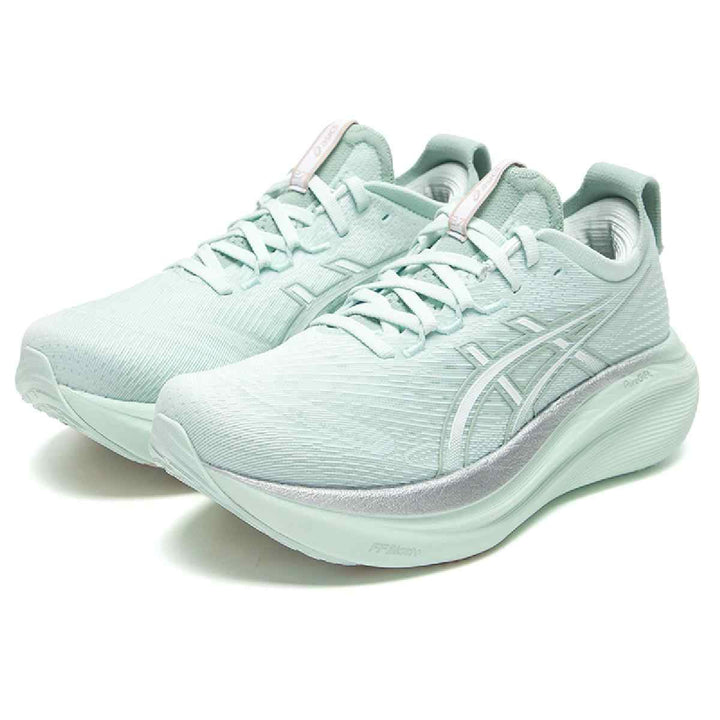 Light green ASICS Gel-Nimbus 27 running shoes with advanced cushioning and mesh design.