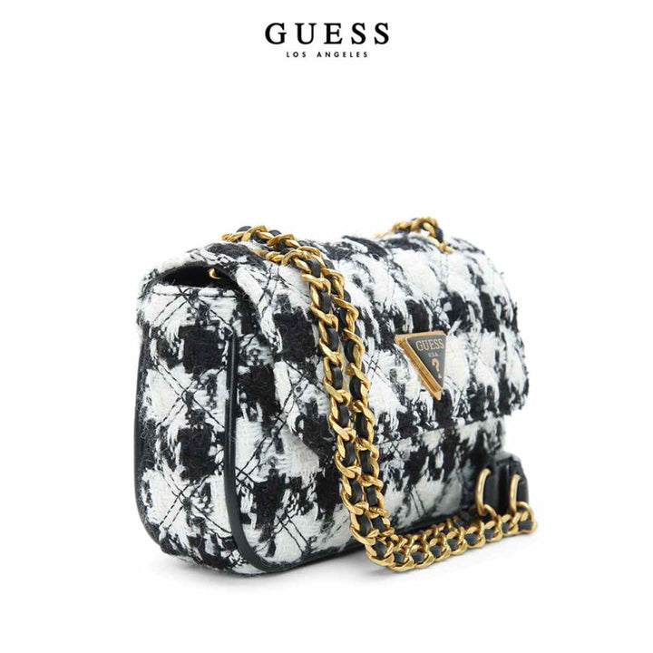 GUESS black crossbody bag with a chic, two-sided pattern and gold chain strap.