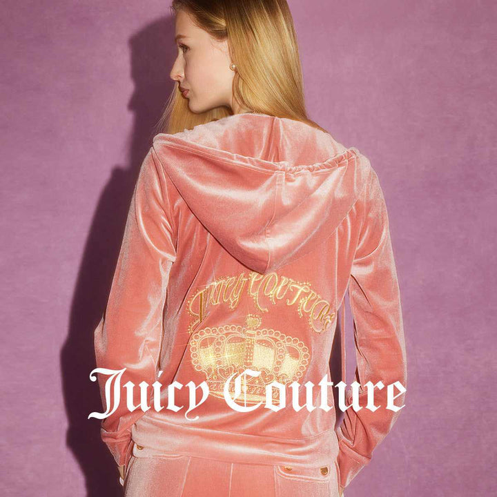 Juicy Couture pink velvet jacket with embellished crown logo and gold zipper.