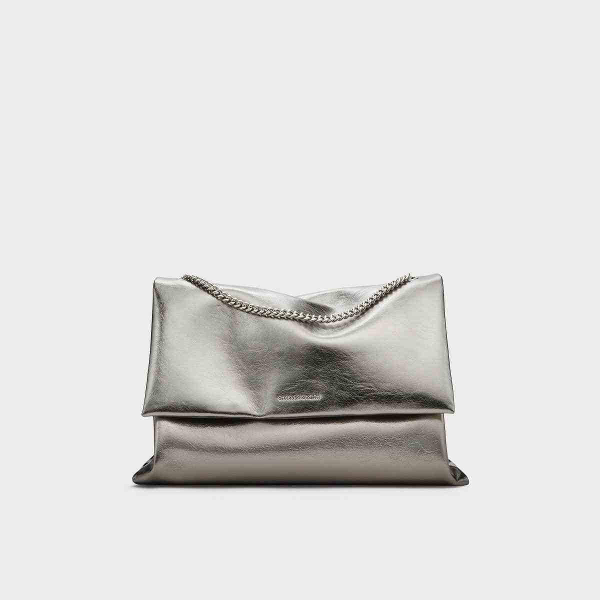 حقيبة Charles & Keith لون Metallic Silver مع سلسلة كتف.