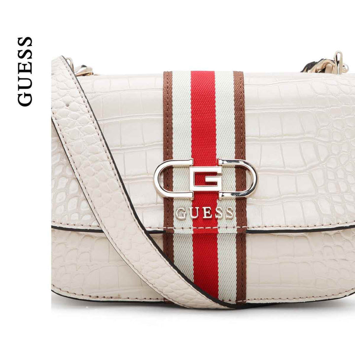 GUESS Nelka Crossbody Flap Bag in stone color with adjustable strap and signature logo.