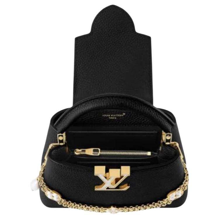 LOUIS VUITTON Capucines Gold Black.
