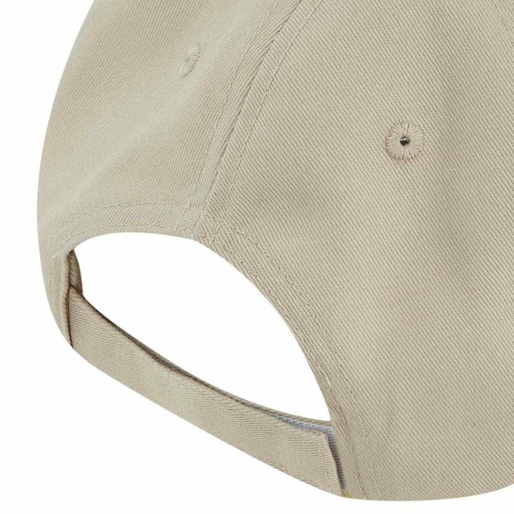Puma unisex baseball cap with adjustable strap in beige color.