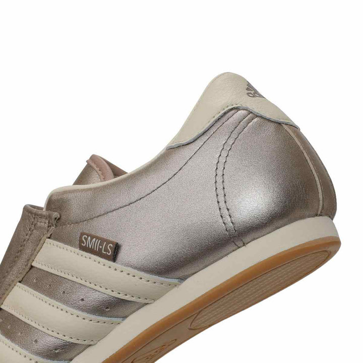 Luxurious Adidas Smills slip-on sneaker with classic design and cream accents.