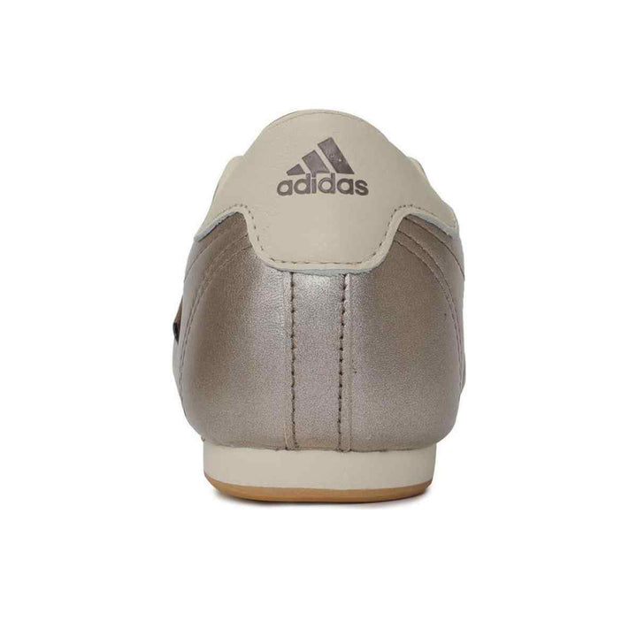 Adidas Clover Smills Slip-On luxury sneaker, rear view, cream and metallic details.