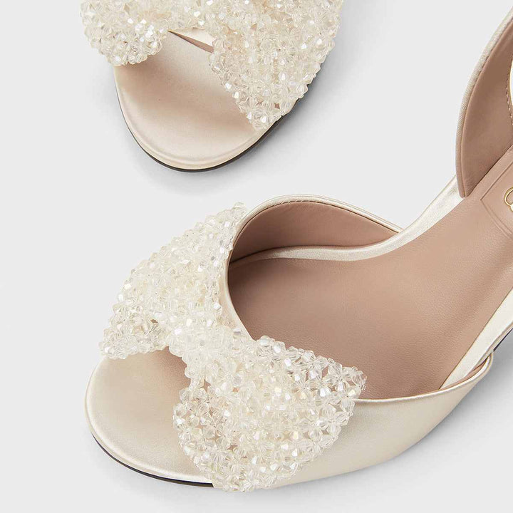 Elegant recycled heels by CHARLES&KEITH with beaded design.