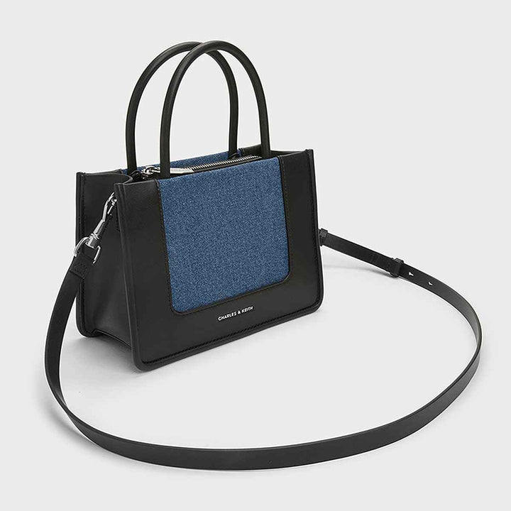 CHARLES&KEITH Black Handbag with Denim Accents and Removable Strap