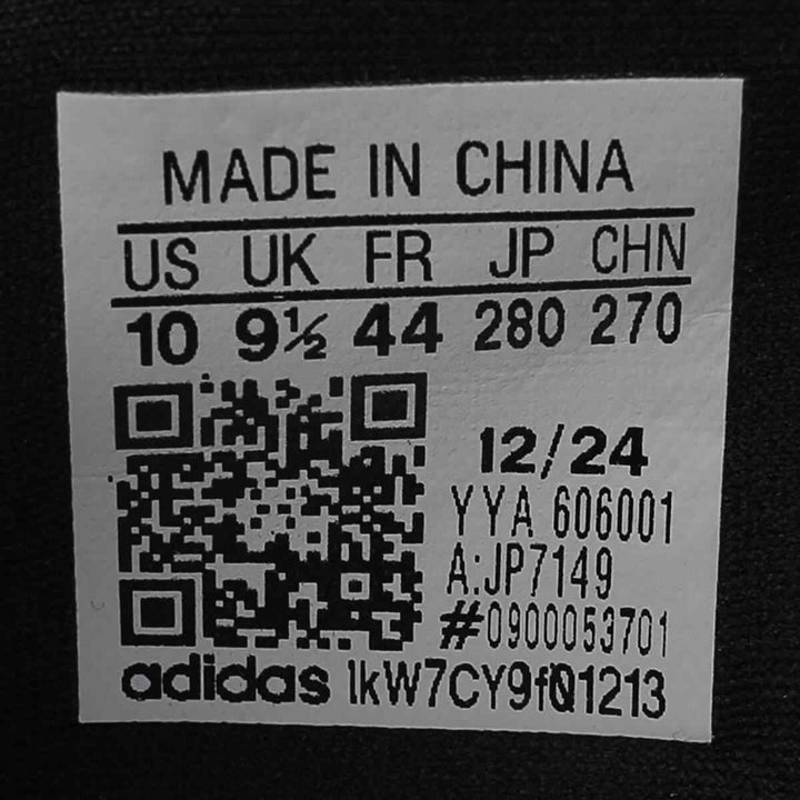 adidas Adizero running shoes label with size and manufacturing details.