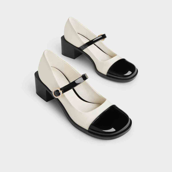 CHARLES&KEITH white and black Mary Jane block heel shoes with embellished strap and square toe.