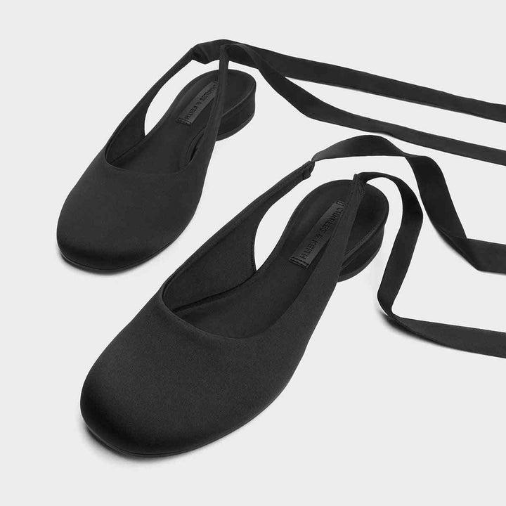 CHARLES&KEITH satin lace-up flat shoes with elegant feminine design.