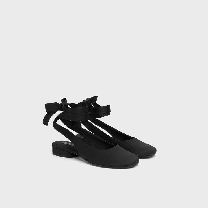Flat shoes with satin lace from CHARLES&KEITH, featuring round toe and ankle wrap design.