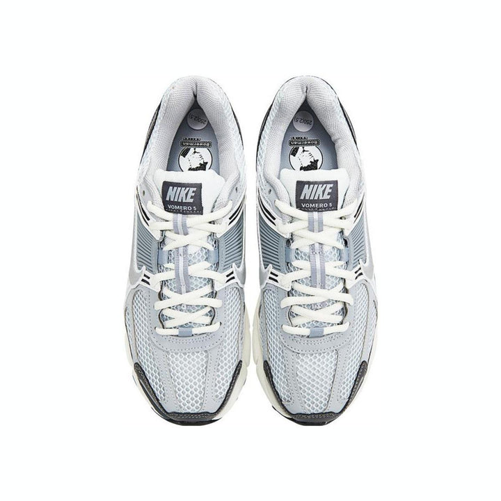 Nike Zoom Vomero 5 women's sneaker, modern gray design, durable comfort.