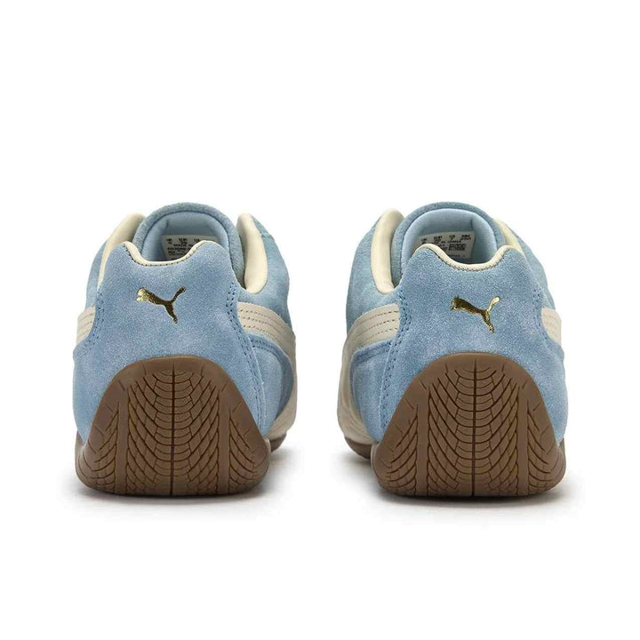 PUMA Palermo OG Blue Skies suede casual sneakers with ivory stripes and brown rubber soles viewed from the back