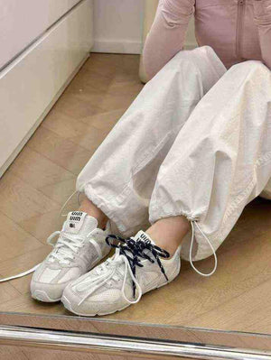 سنيكيرز New Balance من الشبك والجلد السويديNew Balance X Miu Miu.