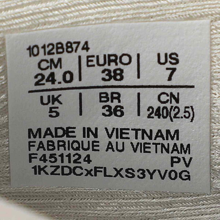 ASICS Gel-Nimbus 27 shoe label showing size and manufacturing details.