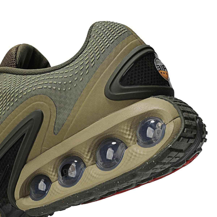 Nike Air Max DN olive green sneaker with dynamic Air unit and futuristic design.