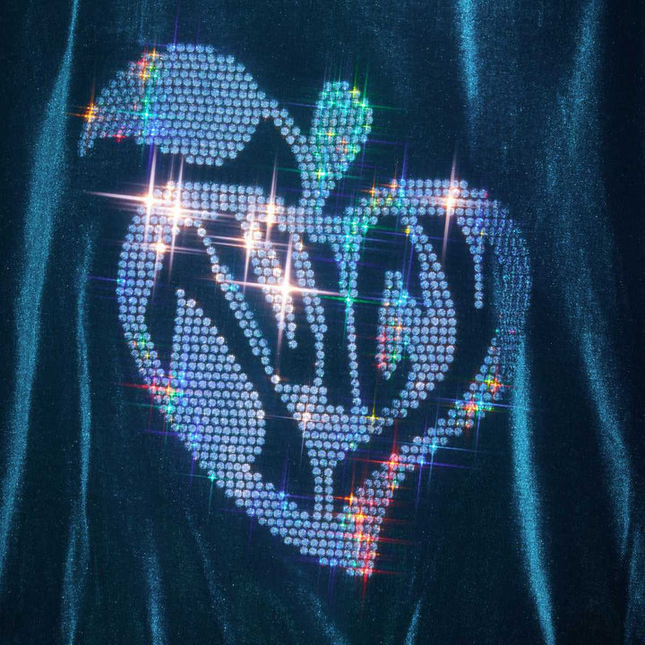 Juicy Couture blue velvet sweatshirt with sparkling rhinestones in heart shape logo.