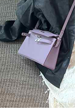 Racechoice Crossbody Bag in premium purple with wide strap.