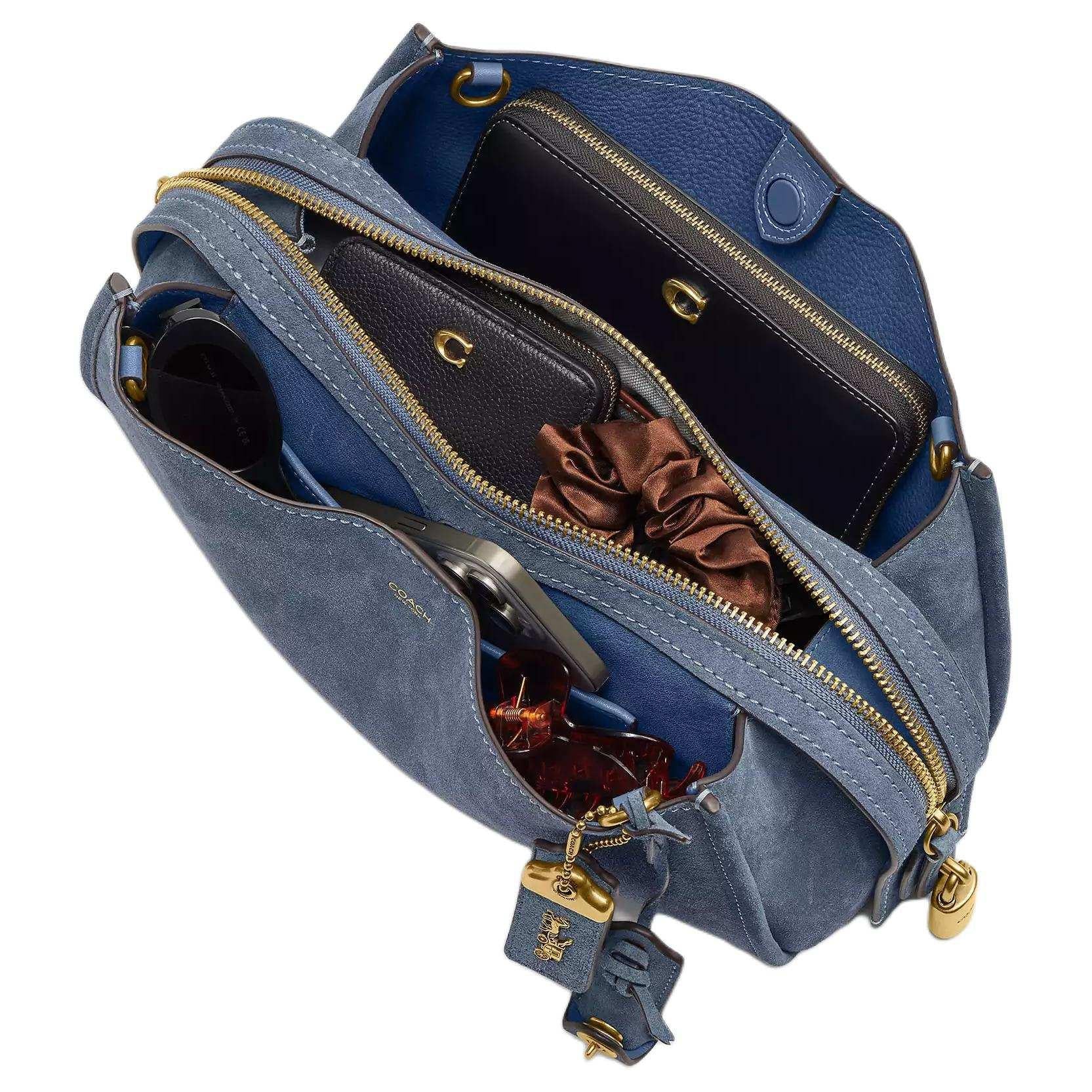 COACH Rogue 34 denim.