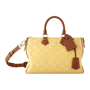 حقيبة Louis Vuitton Speedy 30 باللون الأصفر المميز.