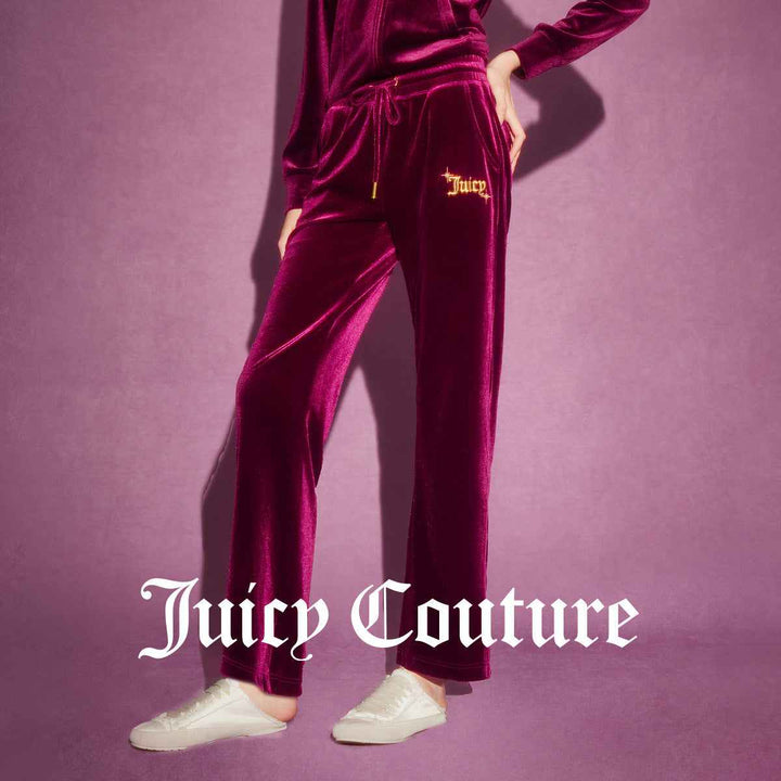 Juicy Couture velour pants in rich velvet with gold button back pockets, embroidered Juicy logo, elastic waistband, and adjustable drawstring.