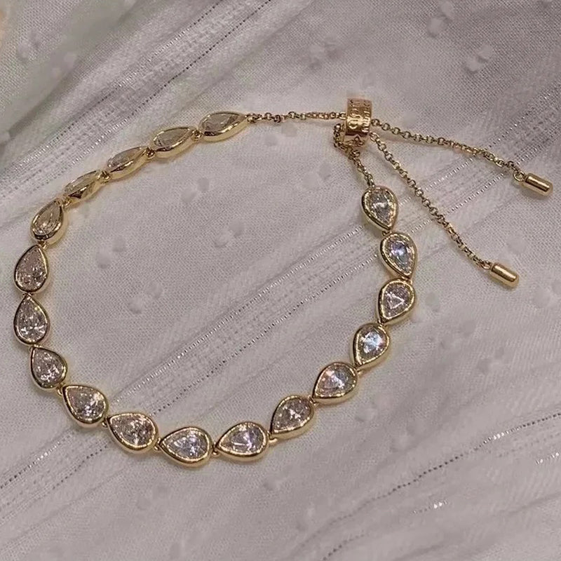apm monaco adjustable waterdrop delicate bracelet for women, gold